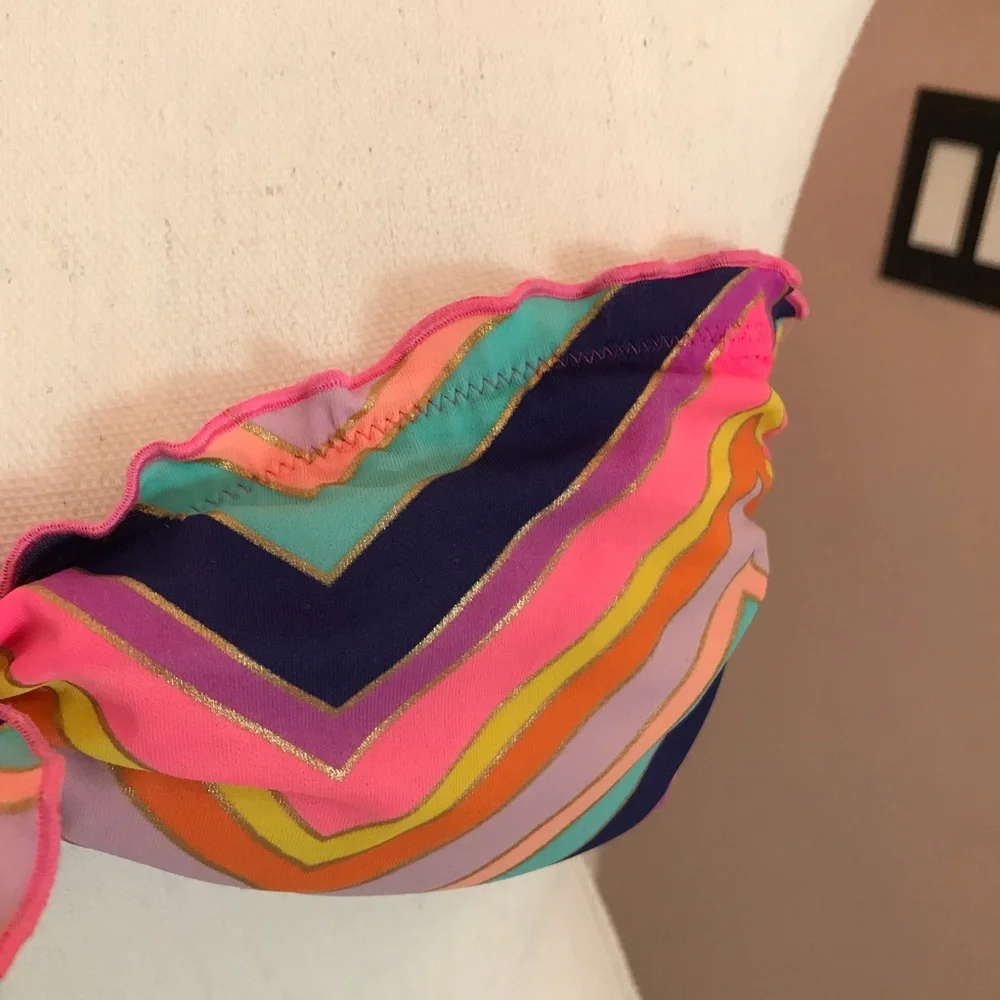 Victoria’s Secret bikini top with gold trim